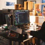 Ali & Emma working at standing desk